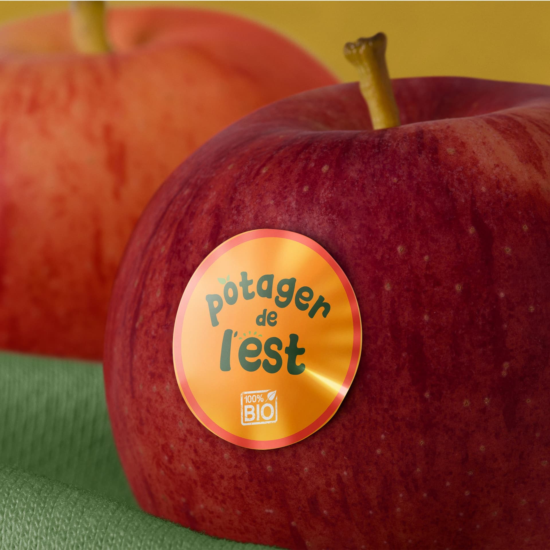 An apple with the Potager de L'est logo
